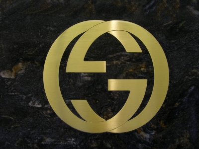 Inlaid logo made out of cosmos granite.