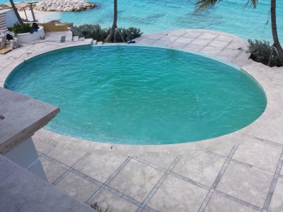 Pool Coping And Tile of Jerusalem Grey Limestone With Silver Travertine Accent Strips